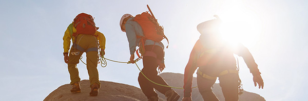 Image of hikers on top of a moutain